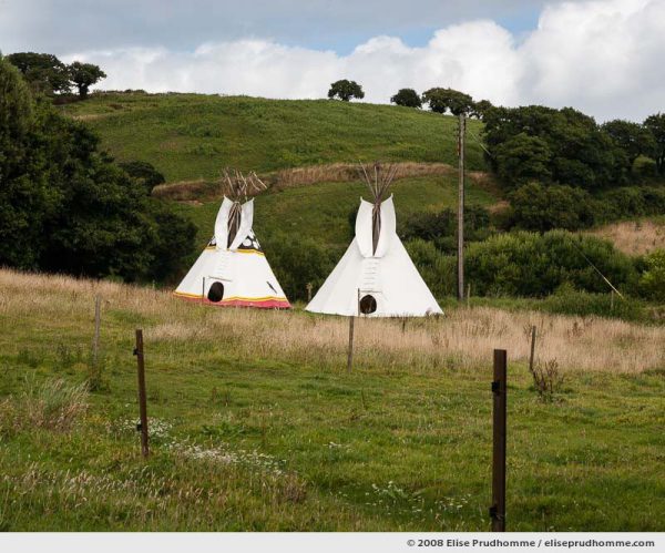 Nostalgic wilderness campsite and two teepees, Jersey, Channel Islands, 2008 by Elise Prudhomme.