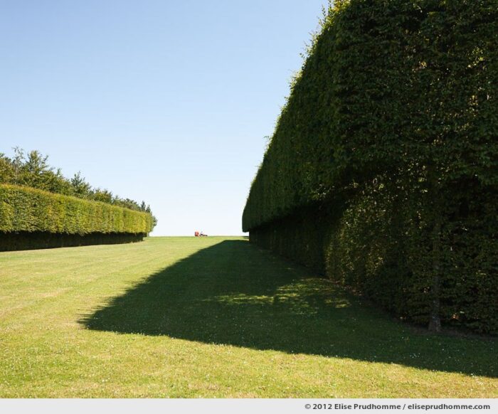 Cutting the lawn at Brecy Castle Gardens, Saint Gabriel Brécy, France, 2012 (series Notable Gardens of France) by Elise Prudhomme.