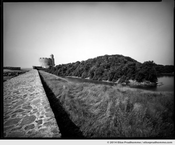 Moat and Vauban Fort seen from the bastion wall, Tatihou Island, Saint-Vaast-la-Hougue, France. 2014 (series Sands of Time) by Elise Prudhomme.