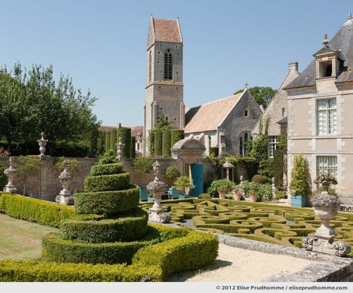 View of the church and château from the first terrace, Brecy Castle Gardens, Saint Gabriel Brécy, France, 2012 (series Notable Gardens of France) by Elise Prudhomme.