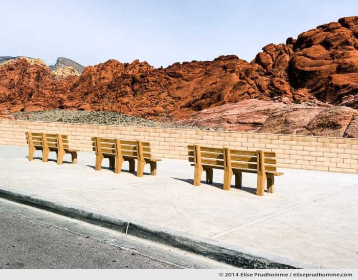 Benches and seating area at a scenic viewpoint in Red Rock Canyon National Conservation Area, Nevada, USA. 2014 (series Wild Wild West) by Elise Prudhomme.