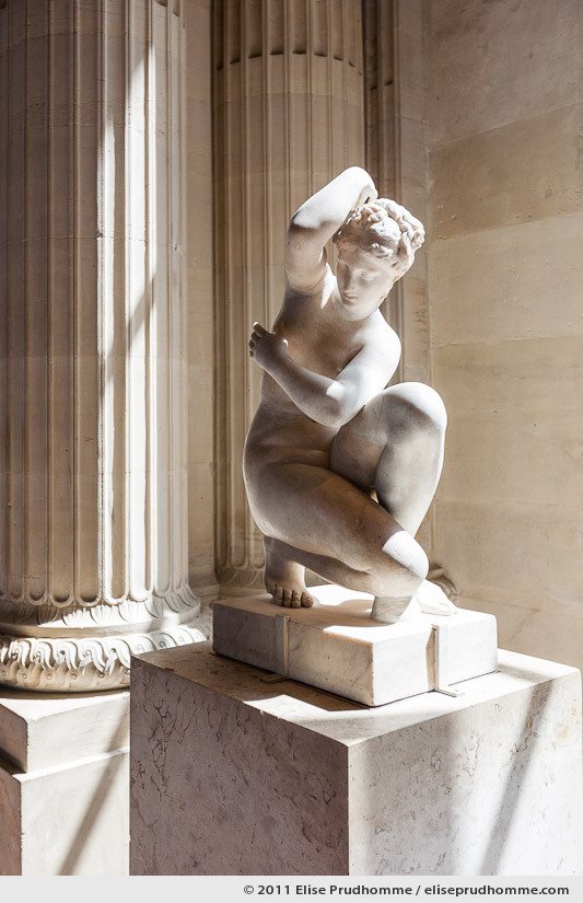 Crouching Venus by an unknown artist during I or II century A.D., at the Louvre Museum, Paris, France, 2011 by Elise Prudhomme.