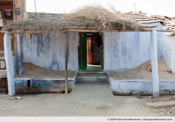 Simple porch and doorway entrance to a house in Rohet village, Rajasthan, Jodhpur, India, 2009 by Elise Prudhomme.