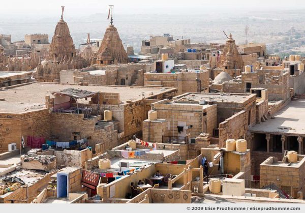 Rooftop view over Jaisalmer fortress with Jain temples in the distance, Western Rajasthan, India, 2009 by Elise Prudhomme