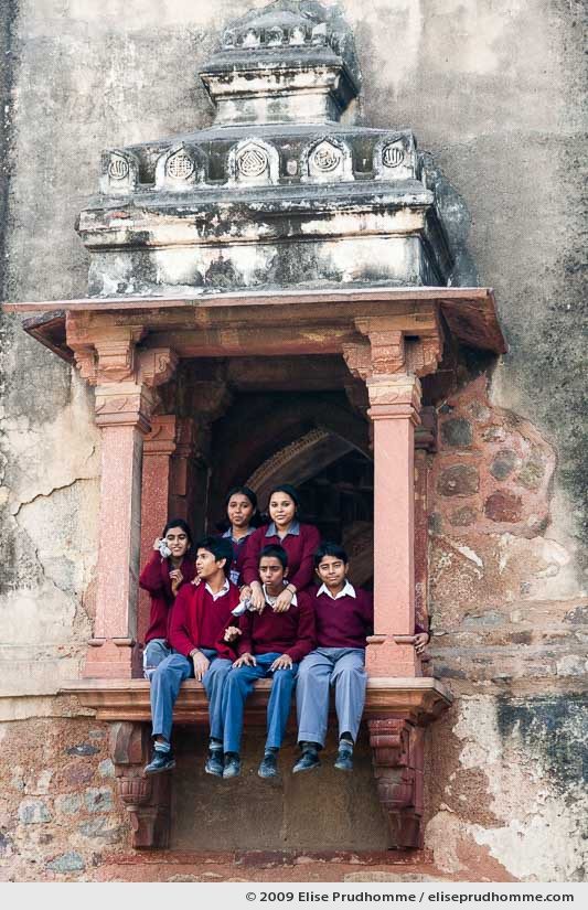 School students relaxing in front of Shisha Gumbad, Lodi Gardens, Delhi, India, 2009 by Elise Prudhomme