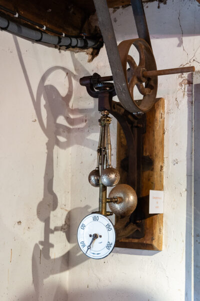 This Watt Ball Regulator monitors the flow of water entering the hydraulic turbine. Restoration of the Saint-Gabriel Flour Mill, Saint-Gabriel-Brecy, France.