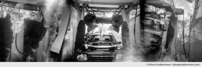 Black and white photograph of a carwash, Brasilia, Brasil.  Analog photography series entitled Lieux-dits by Elise Prudhomme.