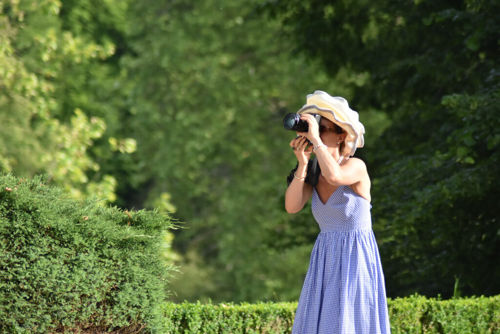 Elise Prudhomme photographing in Vichy gingham by Rodolphe Aymard