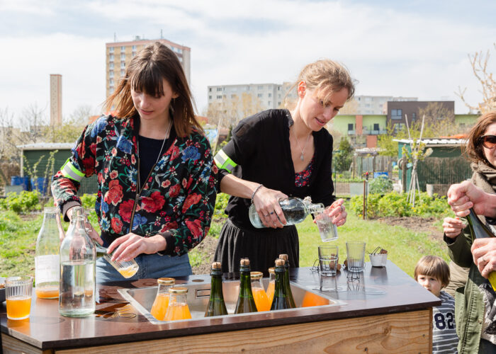 Mona and Alice Prudhomme serving farm fresh cider at the Sensitive Zone - Urban Farm of Saint-Denis on 9 April 2019.