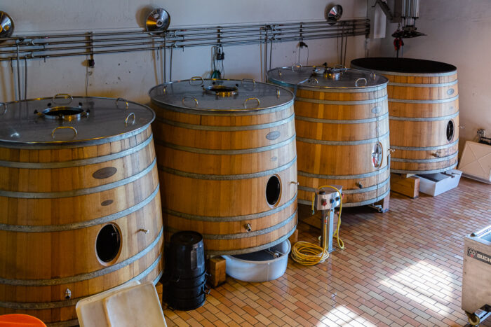Soon to be replaced wooden fermentation tanks for Merlot wine, Wine Estate Chateau Pavie Macquin, Saint Emilion, Bordeaux region, Gironde, France.