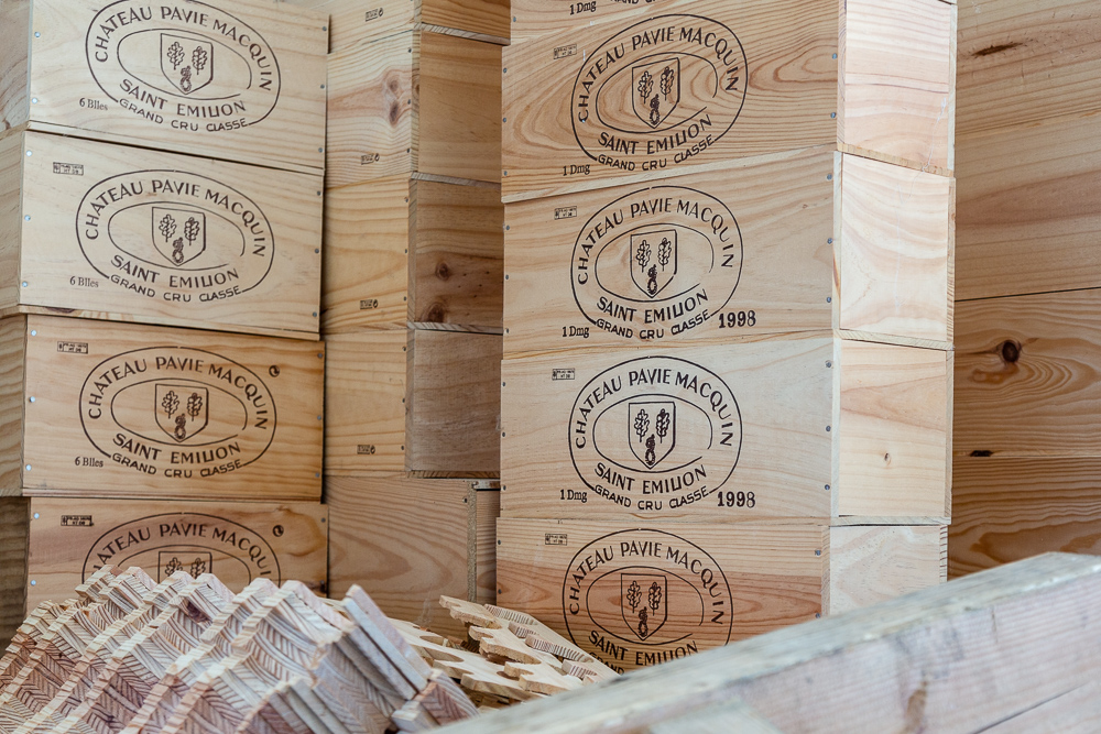 Wooden shipping boxes in stock for delivery at Wine Estate Château Pavie Macquin, Saint Émilion, Department of the Gironde, France.