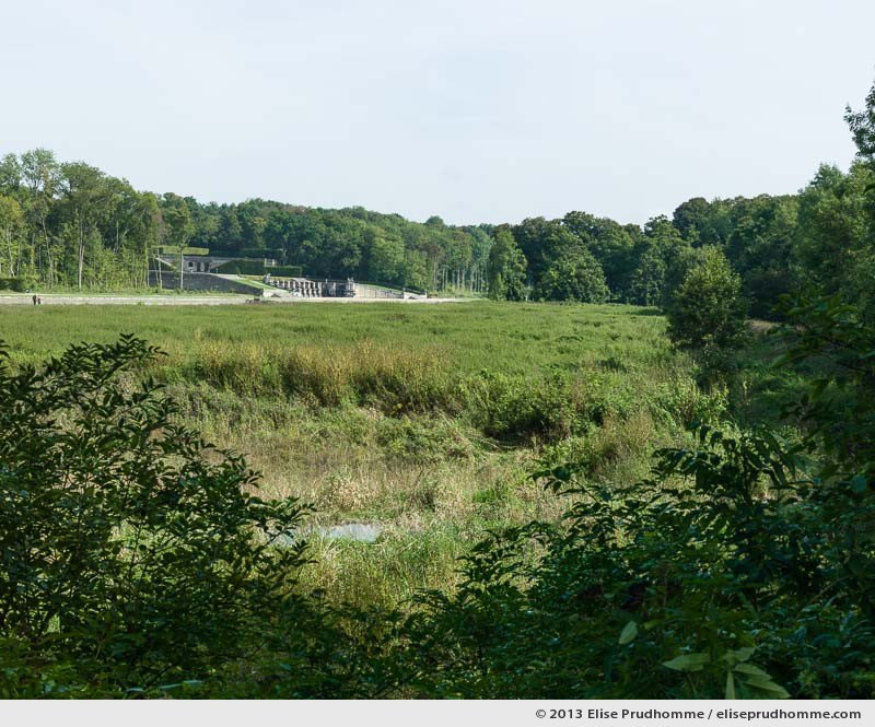 Distant view of the cascades from the park of the Château of Vaux-le-Vicomte, Maincy, France. 2013 (series Yours, Mine, Le Nôtre's) by Elise Prudhomme.
