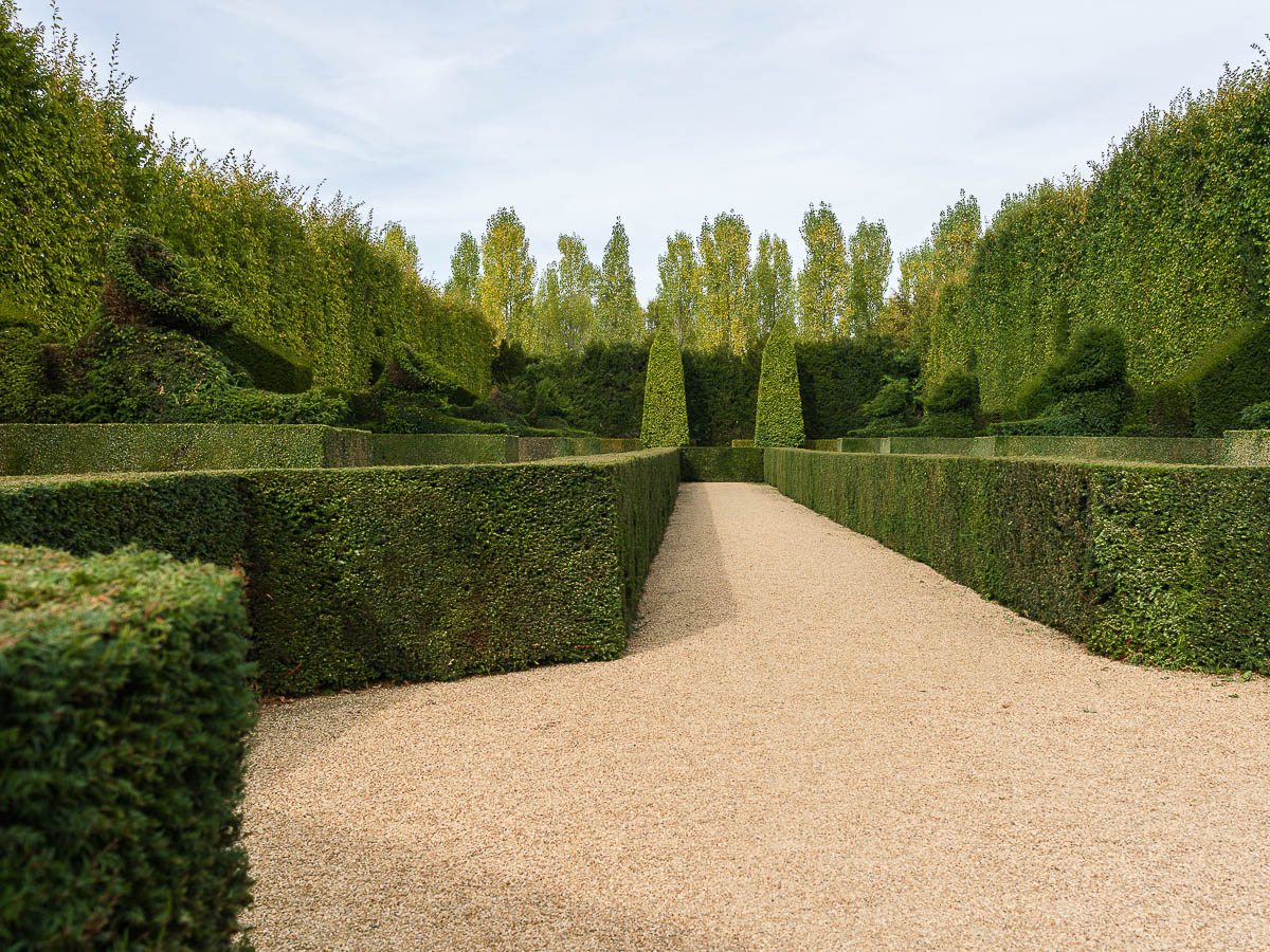 Topiary sculpted in the form of Egyptian Sphinx in the formal gardens of the Chateau du Champ de Bataille, Normandy, France.