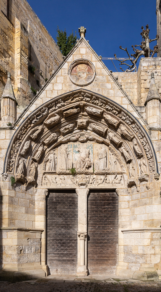 Doors and portico marking the entrance to the rock-carved sanctuary, or Monolith, carved out in the 11th century, Place du Marche, Saint-Emilion, Gironde, France.