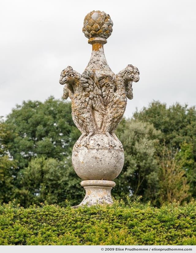 Griffin and artichoke stonework detail, Brecy Castle Gardens, Saint Gabriel Brécy, France, 2009 (series Notable Gardens of France) by Elise Prudhomme.