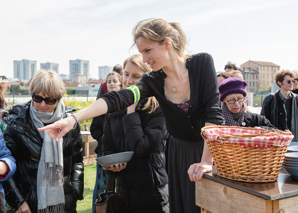 Mona Prudhomme presents dishes prepared by the Food Truck "la Récho" at the Sensitive Zone - Urban Farm of Saint-Denis on 9 April 2019.
