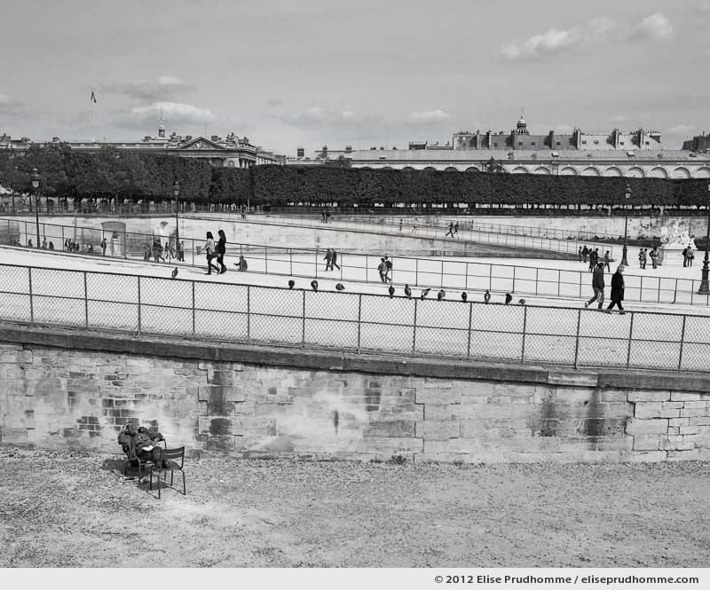 Pause, Tuileries Garden, Paris, France, 2012 (part of the series Yours, Mine, Le Nôtre's) by Elise Prudhomme.
