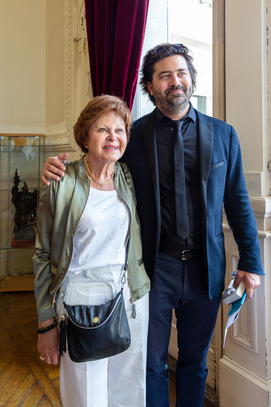 The groom poses with his mother after the civil ceremony of mariage at the Mairie of Vichy, France.