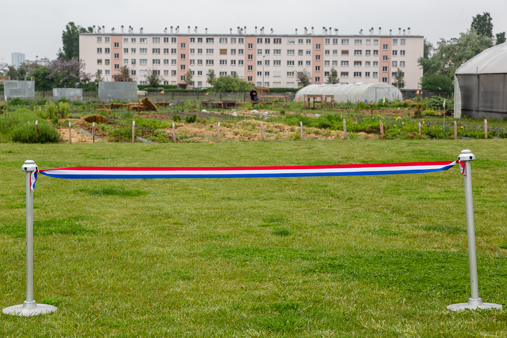 Setting up the ribbon before the inauguration of the Urban Farm of Saint-Denis on 11 May 2019. Inauguration de la Ferme Urbaine de Saint-Denis le 11 mai 2019.  Zone Sensible / Parti Poétique et la Ferme Ouverte de Saint-Denis.
