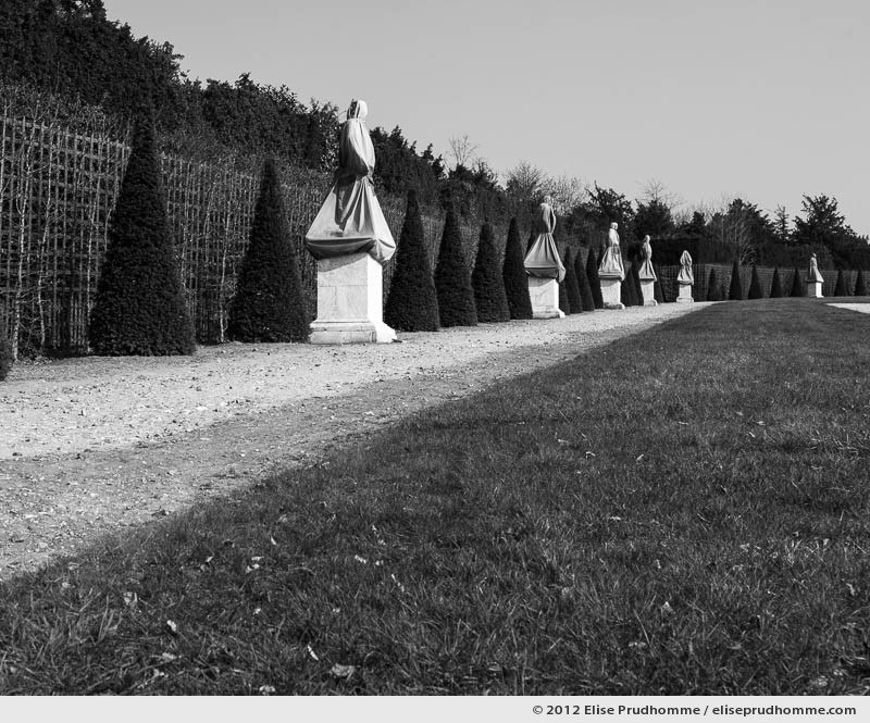 Mime, Versailles Chateau Garden, France, 2012 (part of the series Yours, Mine, Le Nôtre's) by Elise Prudhomme